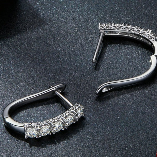 U-shaped silver Earrings.